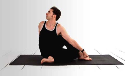 Mark in seated twisted sage pose